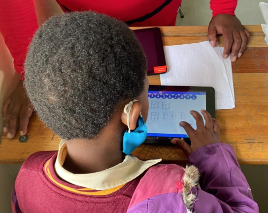 Learner completing MathsPad activities on a tablet